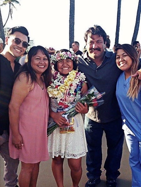 Kaela Higa and her family at her sister's graduation in Hawaii.