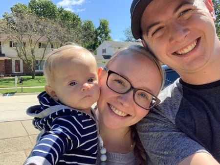 Austin McCool with his wife and son. Austin is a customer experience coordinator at Populus Group.in