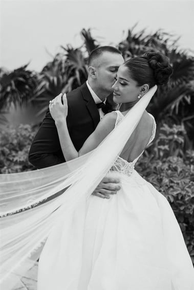 Reem and her husband at their wedding.
